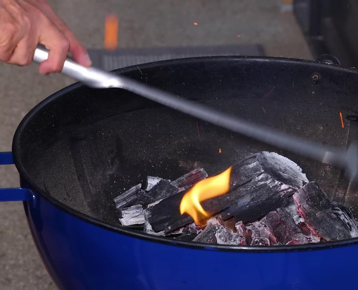 Prepare the grill: Pile charcoal in the center of the grill, adding a few small pieces of mesquite wood for flavor. Let the coals heat up.