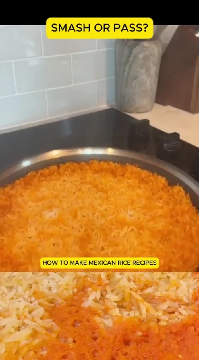 Once cooked, carefully open the lid and fluff the rice.