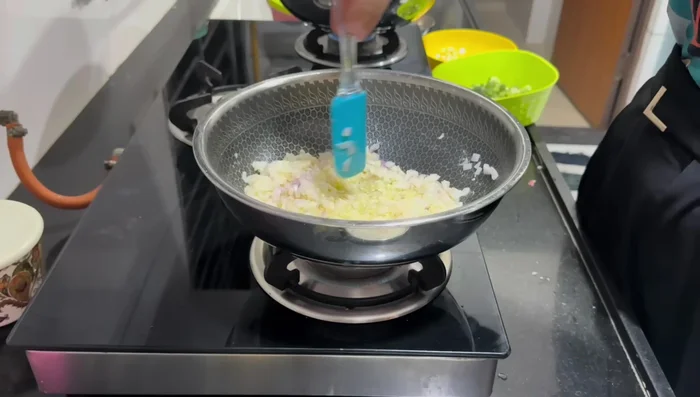 Add onions and sauté until translucent.