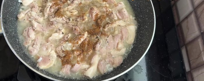 Add black pepper powder, roasted cumin powder, Kashmiri red chili powder, spicy red chili powder, paprika powder (optional), coriander powder, and mixed herbs or oregano (optional). Mix well and fry the chicken with the spices until the oil separates.