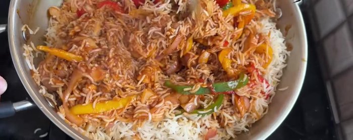 Add the cooked rice, stir and cook on low to medium heat for 10 minutes, covered.