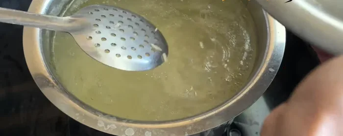 Remove the cooked rice and set aside to cool.