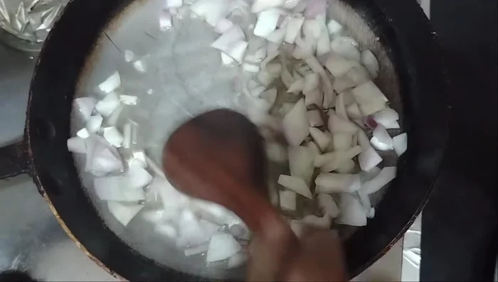 Prepare the sauce: Sauté chopped onions until softened. (197.44)