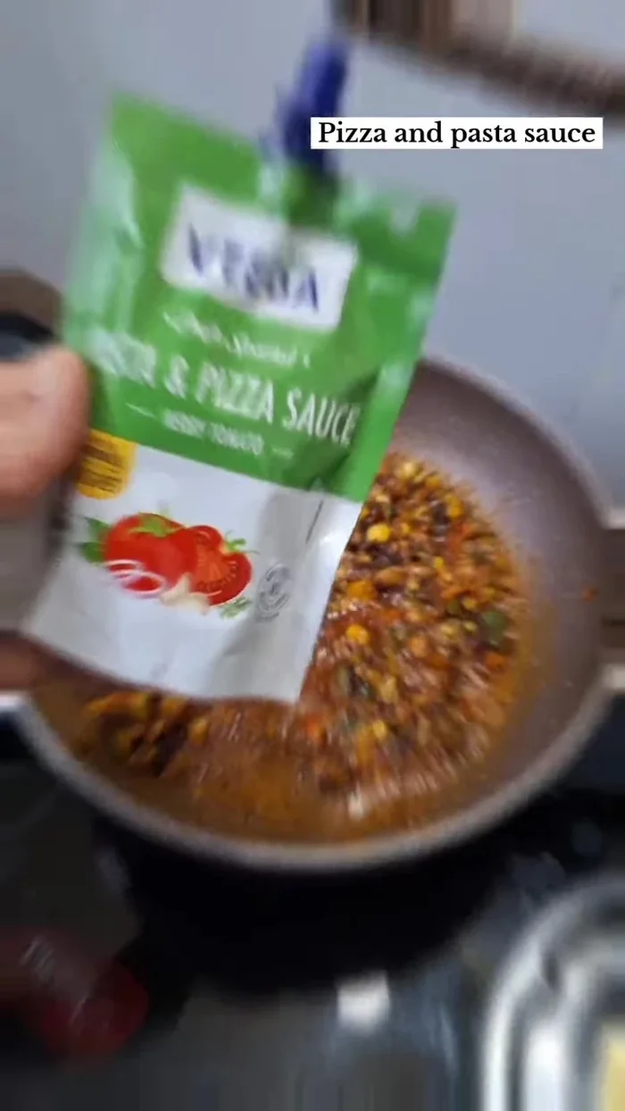 Add pizza pasta sauce and mix well.