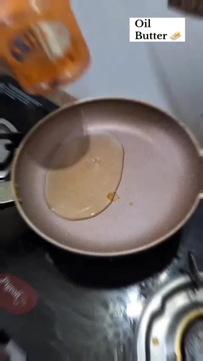 Place another pan. Add oil and butter.