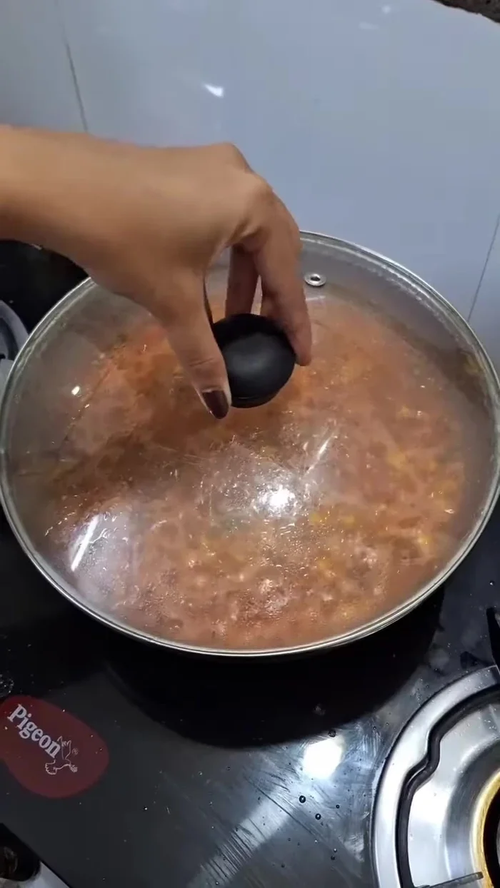 Add one bowl of tomato puree, cover, and cook for 10-15 minutes.