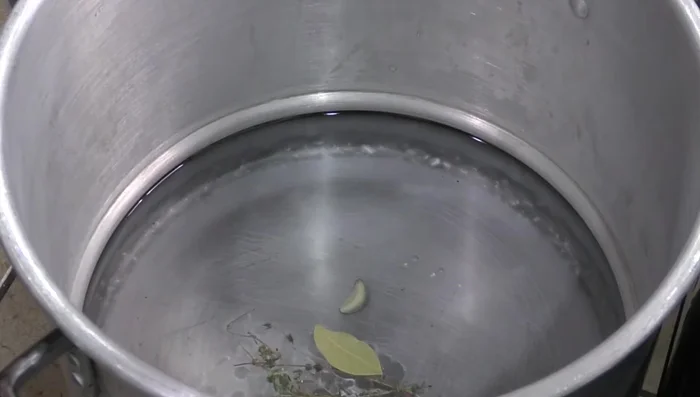 Prepare the consommé: In a separate pot, combine thyme, garlic, bay leaf, onion, marjoram, water, and salt. (304.199)