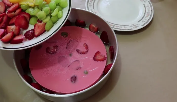 Add the remaining fruit and then the remaining gelatin. Refrigerate until fully set.