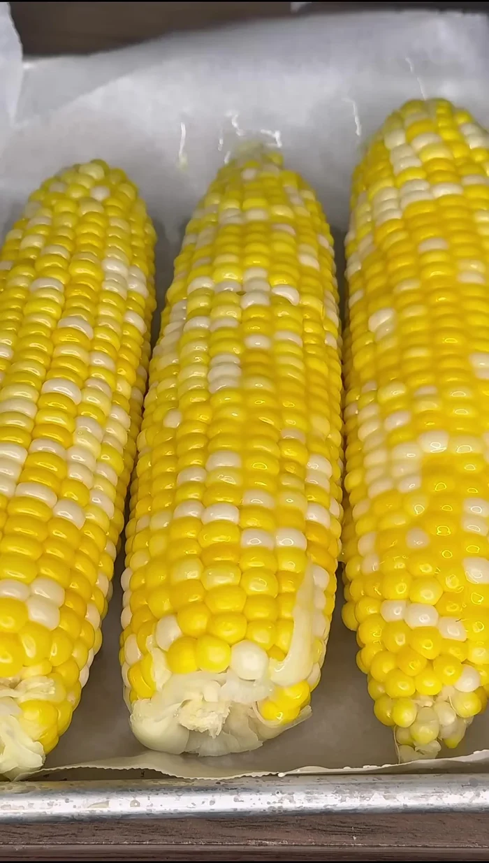 Spread Duke's mayonnaise over the corn.