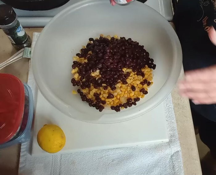 Drain most of the liquid from one can of Rotel (diced tomatoes with green chilies).
