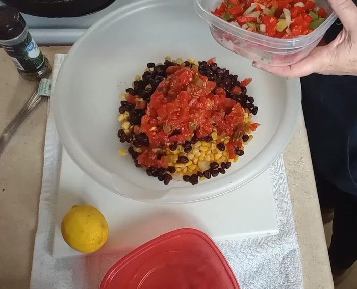 Chop up red and green bell peppers (fresh or frozen).
