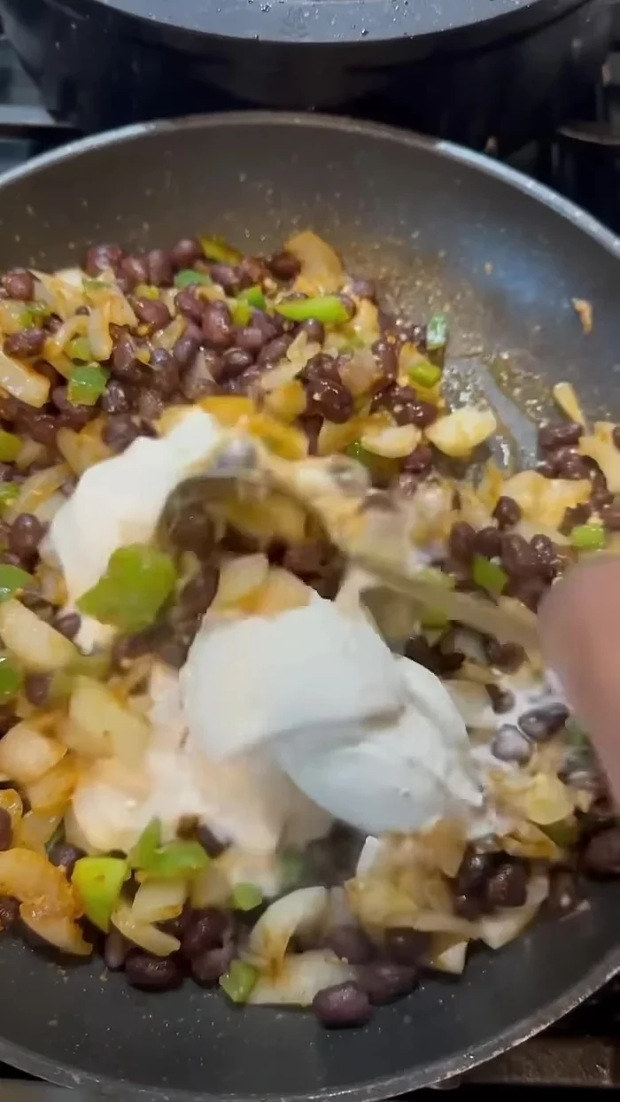 Stir in vegan sour cream and vegan cream cheese.