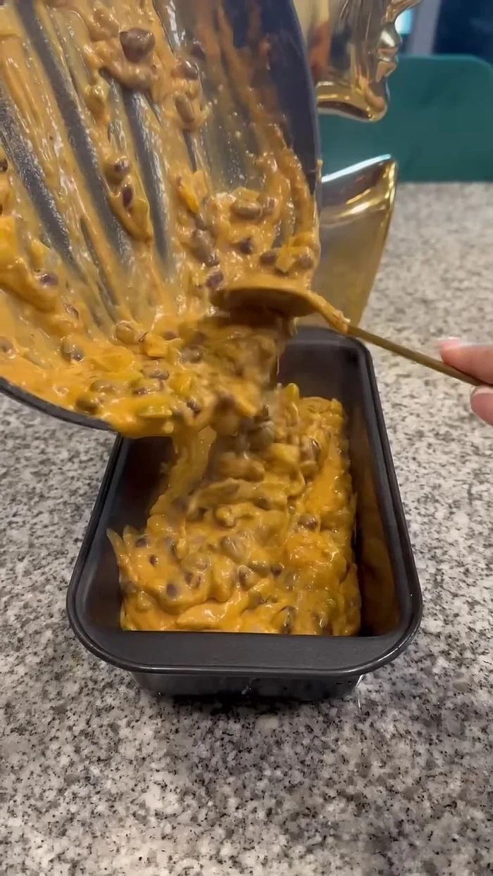 Transfer the mixture to a baking pan or cast iron skillet.