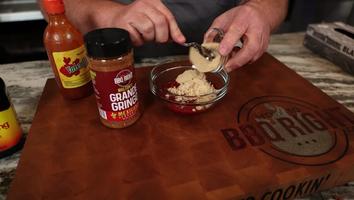 Prepare the glaze: Combine 1 cup of ketchup, brown sugar, Grande Gringo seasoning, Mexican hot sauce, and Maggie seasoning.