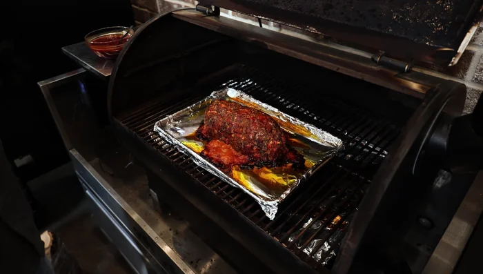 After about 1 hour and 15 minutes of smoking (internal temp 150-155°F), glaze the meatloaf and continue smoking for 10-15 minutes.