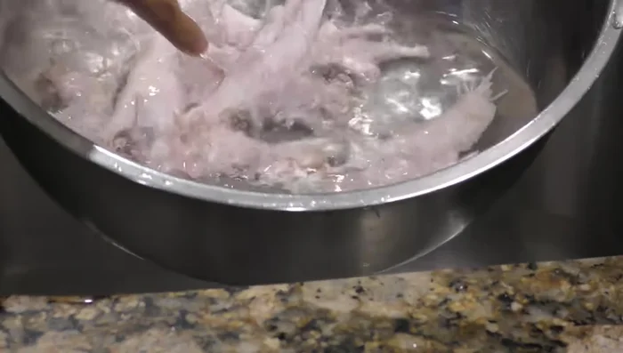 Rinse the chicken feet thoroughly to remove the vinegar and lemon smell.