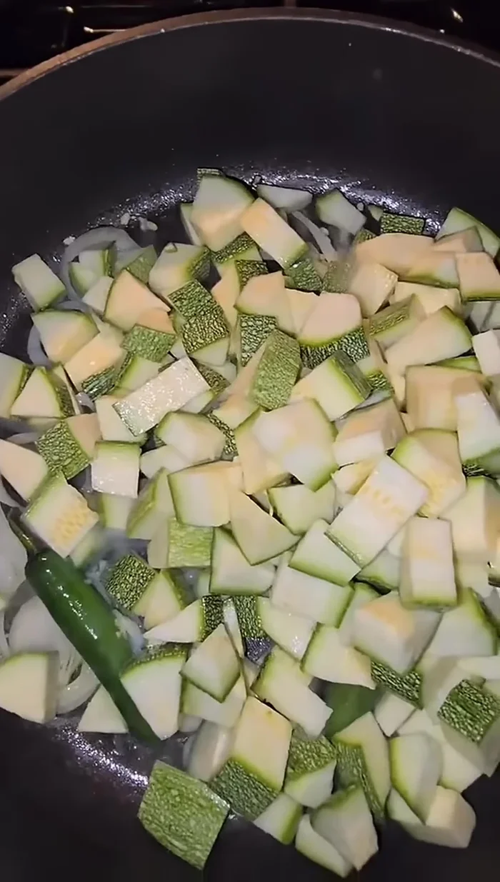 Add serrano pepper (whole or chopped, as preferred).