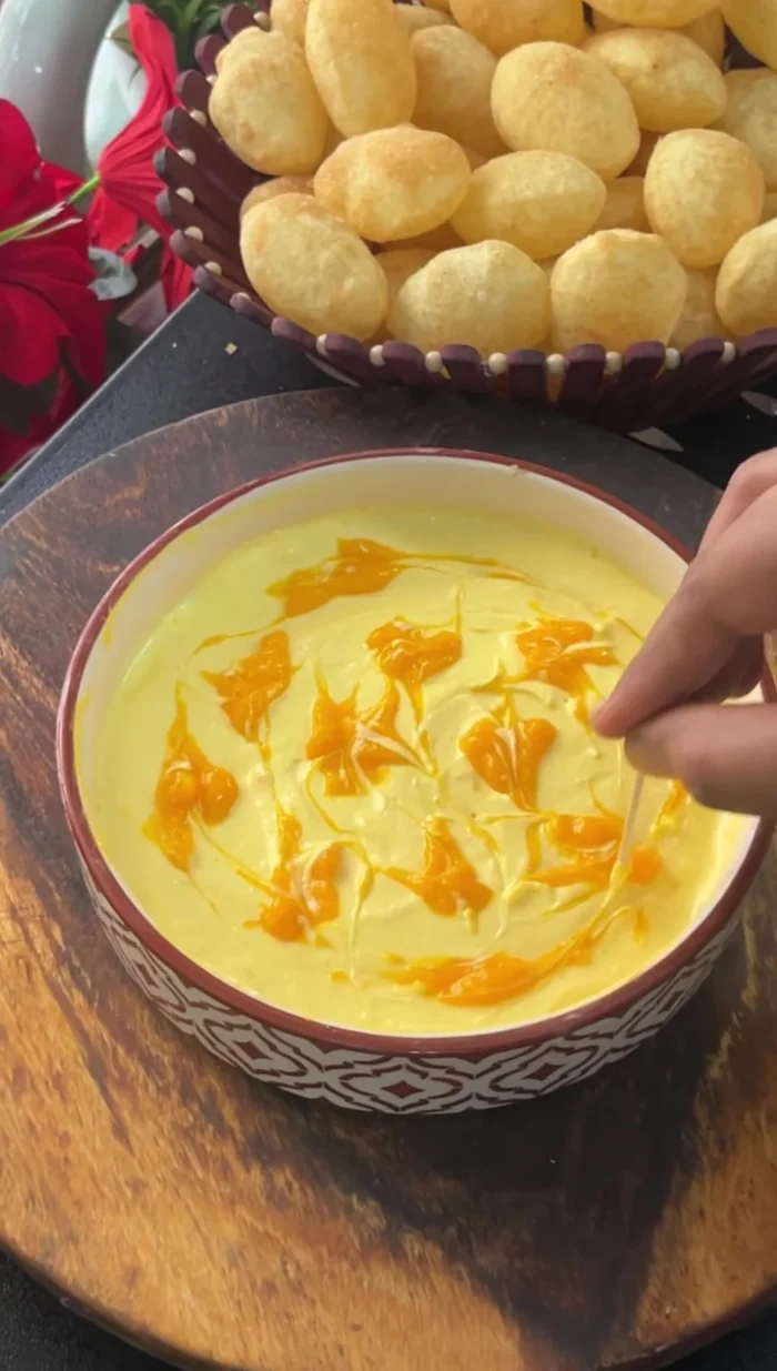 Add more mango puree for a marble effect.