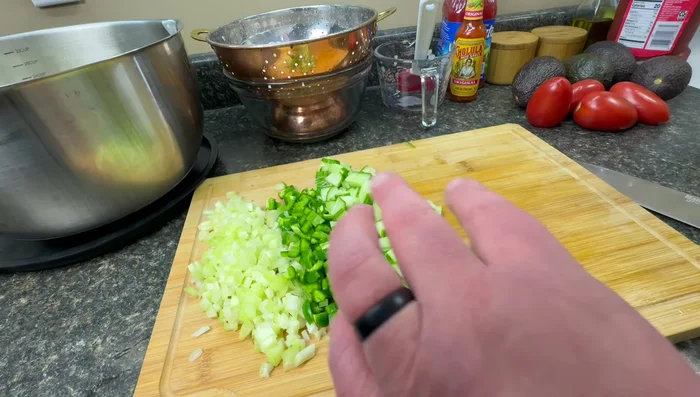 Chop tomatoes into small pieces.