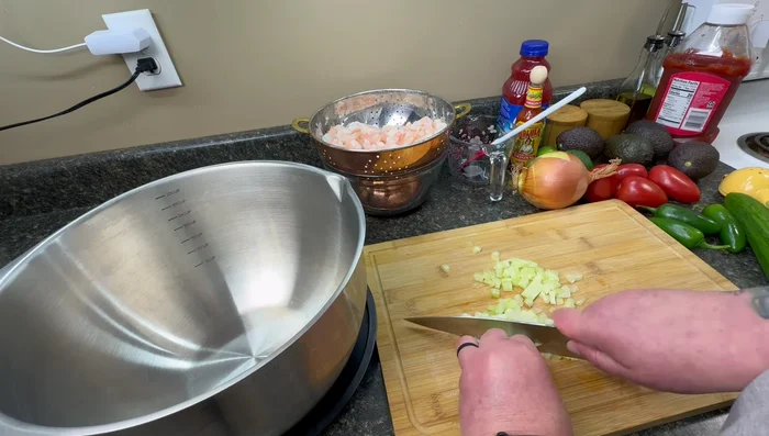 Chop onion. Aim for consistent size with other produce.
