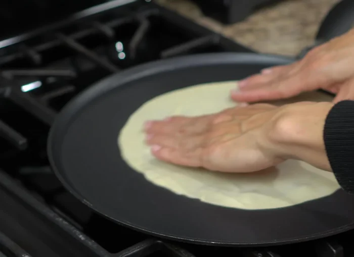 Lightly cook the fritters on a hot griddle for 10-15 seconds per side.