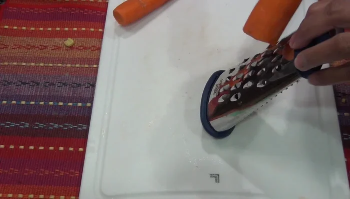 Grate the carrots (or buy pre-grated).