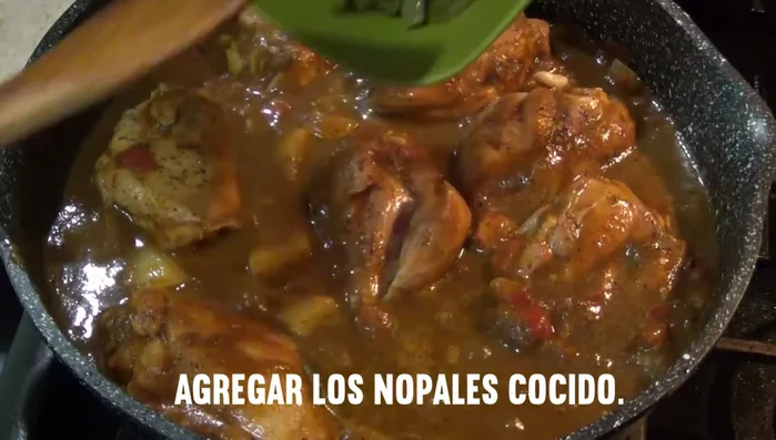 Add the cooked cactus and two cups of water.