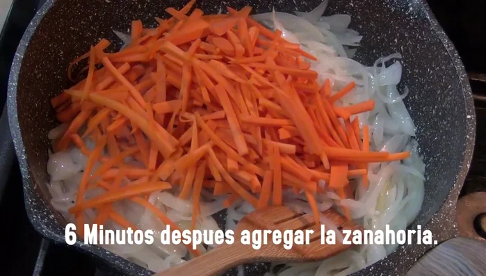 Add carrots and cook.