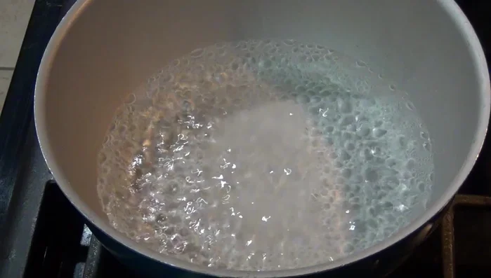 Cook shrimp in 2 1/2 cups of water with salt and garlic cloves for 5 minutes. Turn off heat and let cool.
