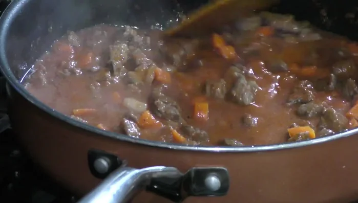 Add tomato sauce: Add the blended tomato sauce and cook for 5 minutes.