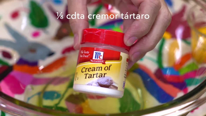 Beat egg whites with a pinch of cream of tartar until fluffy.