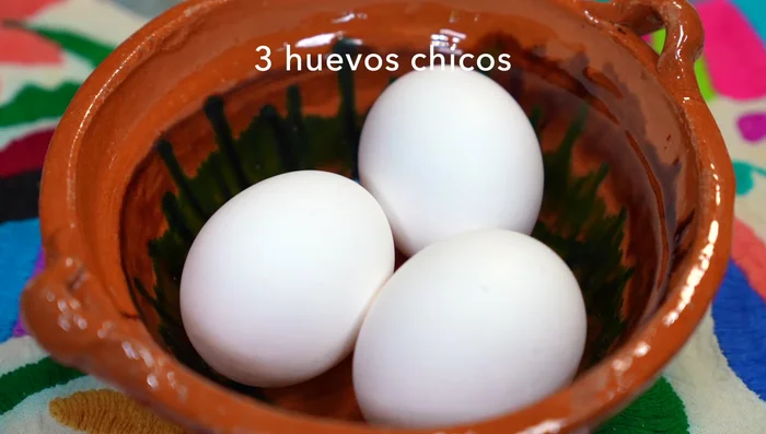 Separate three eggs (at room temperature) into egg whites and yolks.