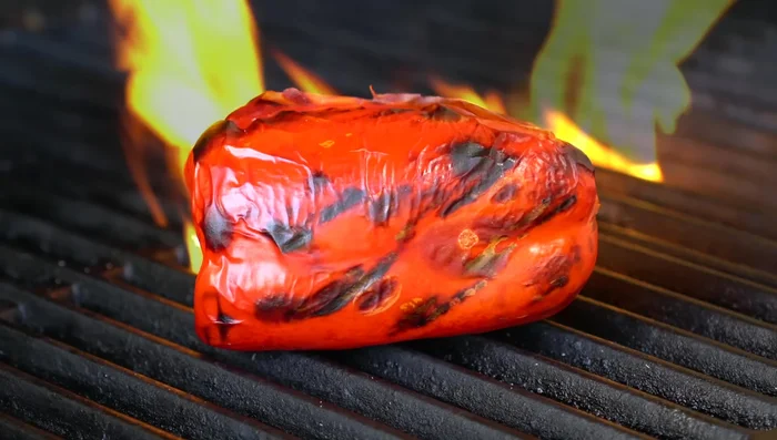 Roast the bell pepper on a comal or grill until charred. Peel, remove seeds.