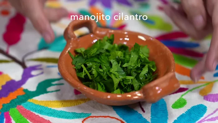 Add chopped cilantro to the dressing.