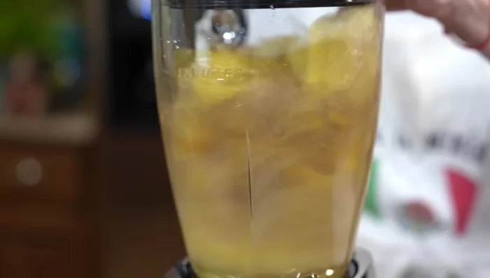 Blend the cooked plantains with the cooking liquid (without the spices) until smooth.