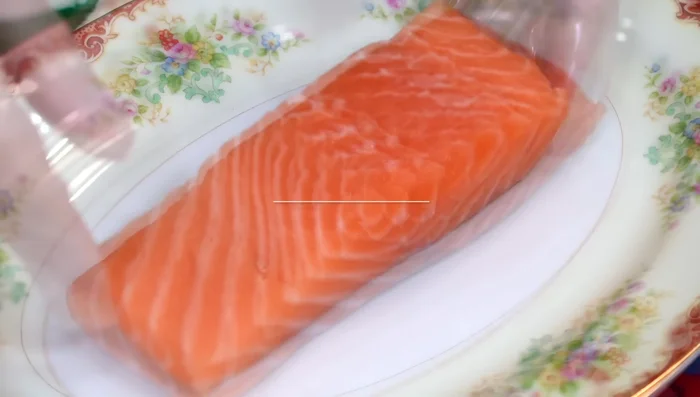 Season the salmon generously with salt and pepper on both sides.