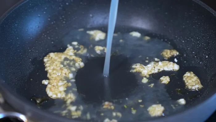 Add lemon juice, salt, and pepper.