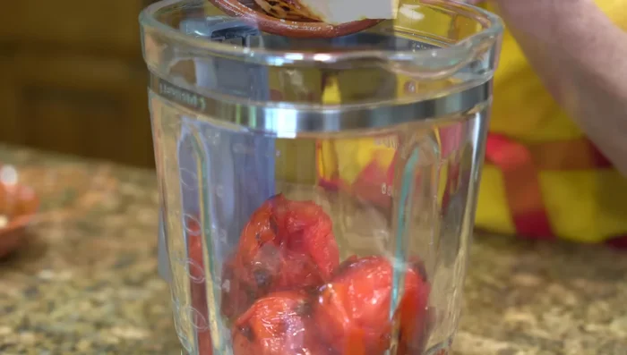 Make Infladitas Sauce: Grill tomatoes, garlic, onion, and serrano peppers. Blend them with salt.