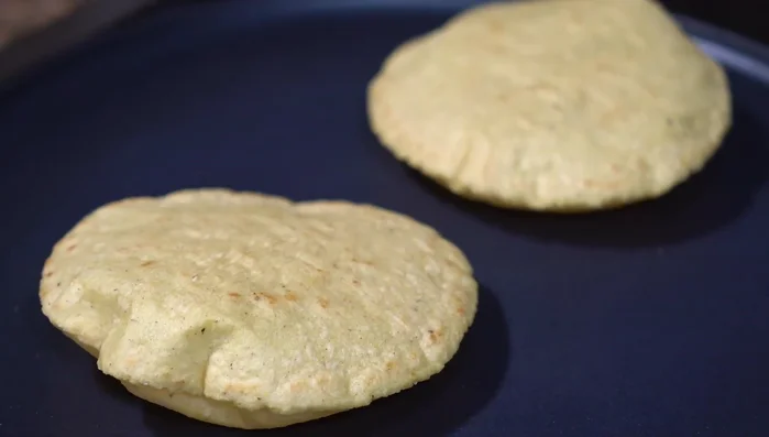 Warm the corn tortillas.