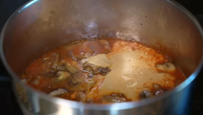 Combine the blended mixture with the rest of the mushrooms; simmer for 10 more minutes.