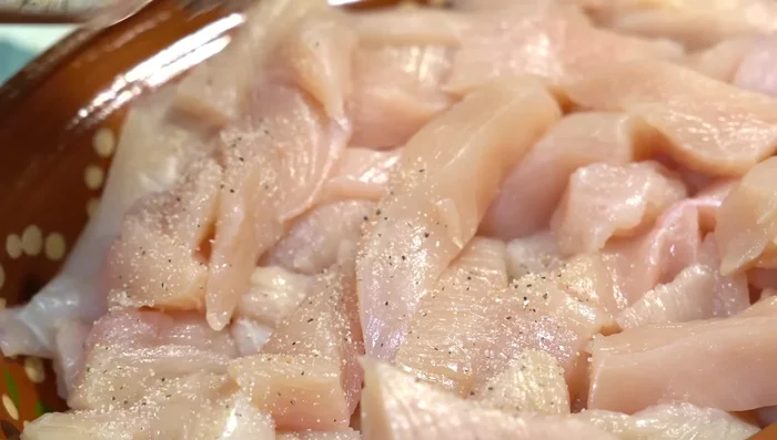 Season the chicken with salt, pepper, garlic powder, and onion powder.