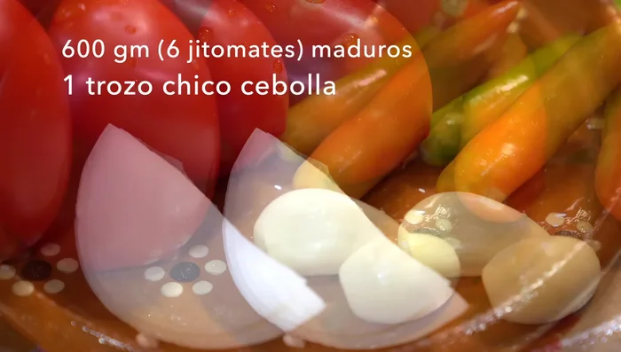 Blend tomatoes, onion, garlic, Serrano peppers (optional), cumin, oregano, and salt; cook the sauce until thickened.