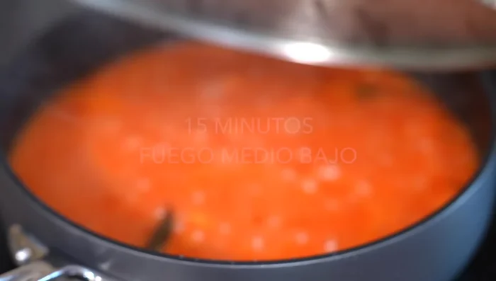 Reduce heat to medium-low, cover, and simmer for 15 minutes. Add the fried chorizo, shredded beef, and more broth as needed.