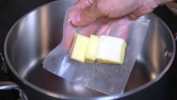 Melt butter in a pan over medium heat. Add the onion and the remaining two cups of corn. Cook for 4-5 minutes.