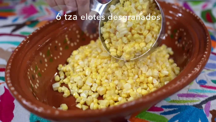 Shell six cups of corn kernels. You can use frozen corn, but avoid canned.