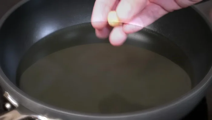 Heat oil in a pan. Form potato mixture into pancakes and cook until golden brown on both sides.