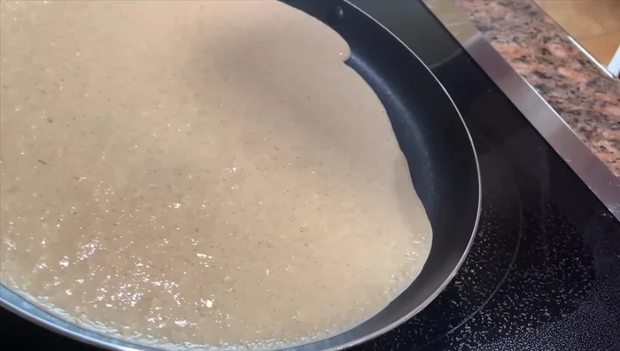 Pour 1/4 to 1/3 cup of crepe batter onto the hot pan. Cook for 45 seconds to 1 minute per side.