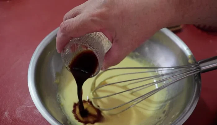 Add vanilla milk gradually while continuously stirring.