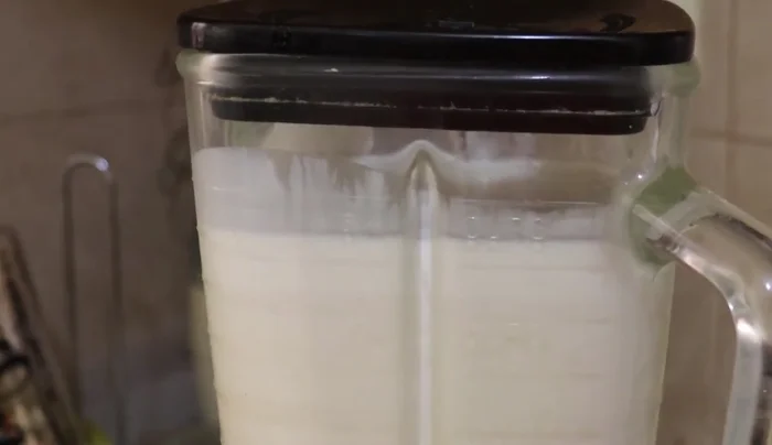 Add the melted unflavored gelatin to the three-milk mixture and blend well.