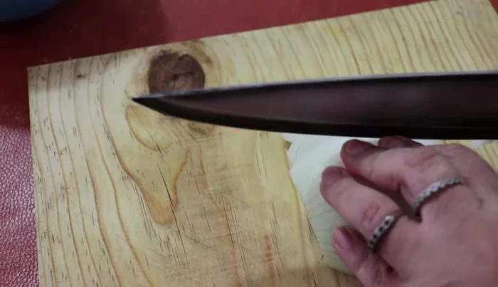 Finely chop half an onion.